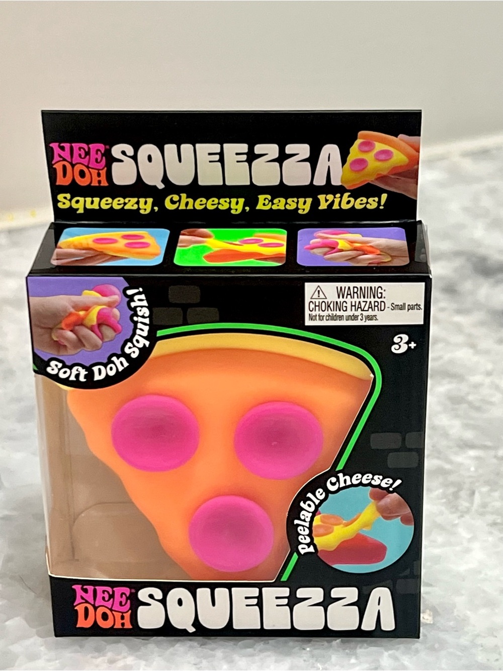 Nee Doh Squeezza Pizza Slice Squishy Toy